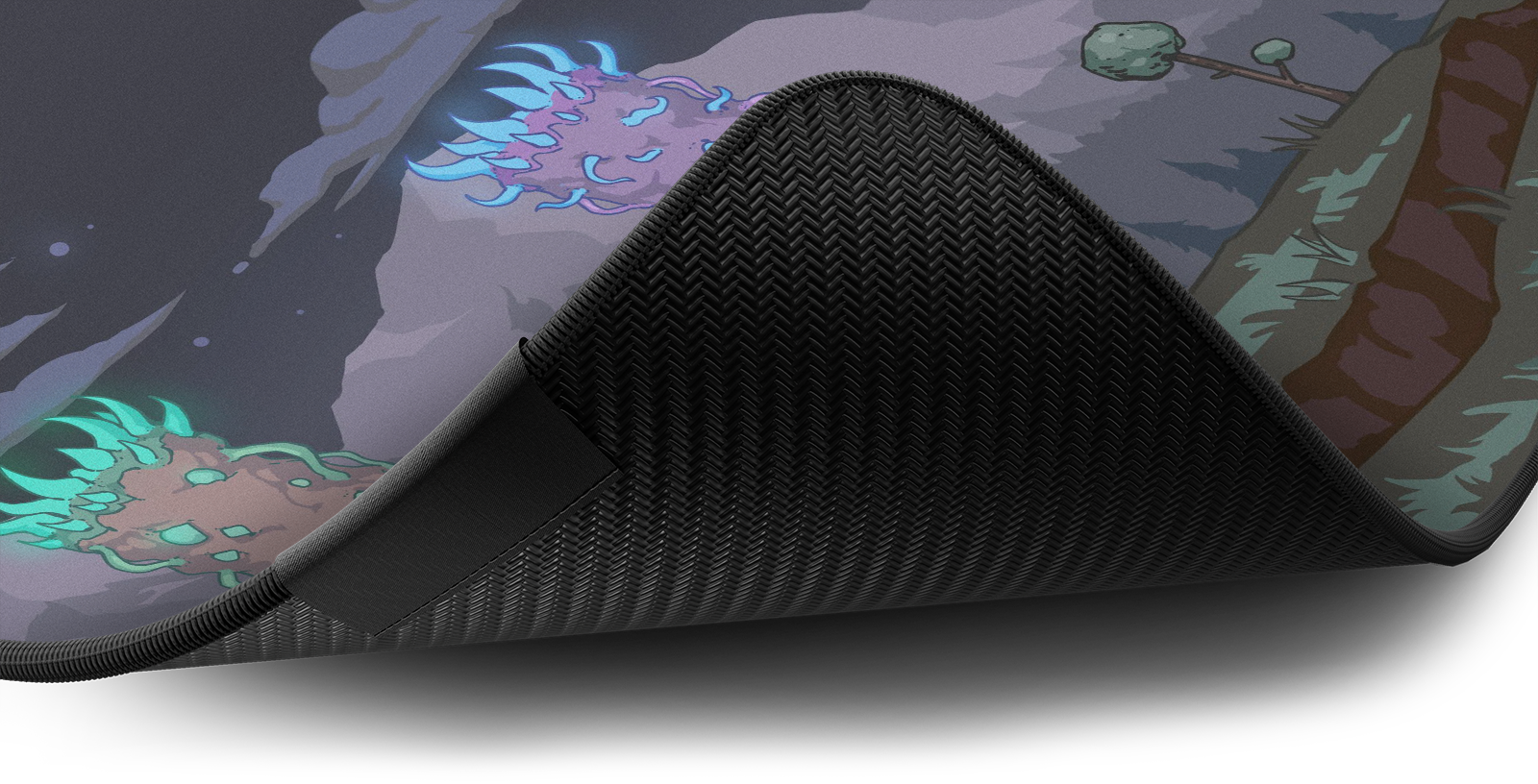 Close-up of the stitched edge and non-slip rubber base of the Hystar Moon Lord deskmat