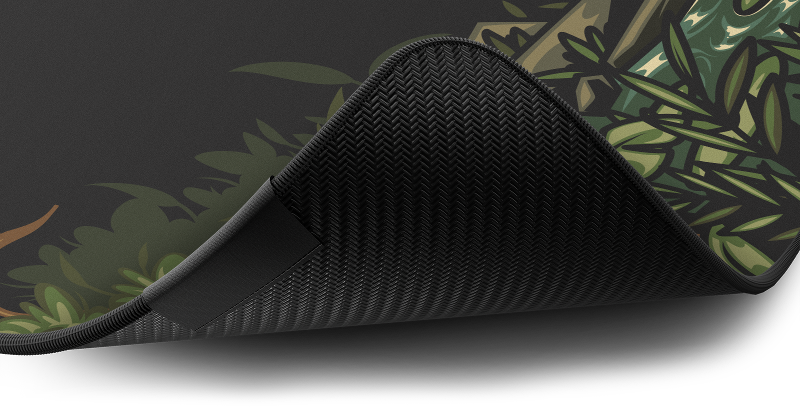 Close-up of the stitched edge and non-slip rubber base of the Hystar Midori deskmat