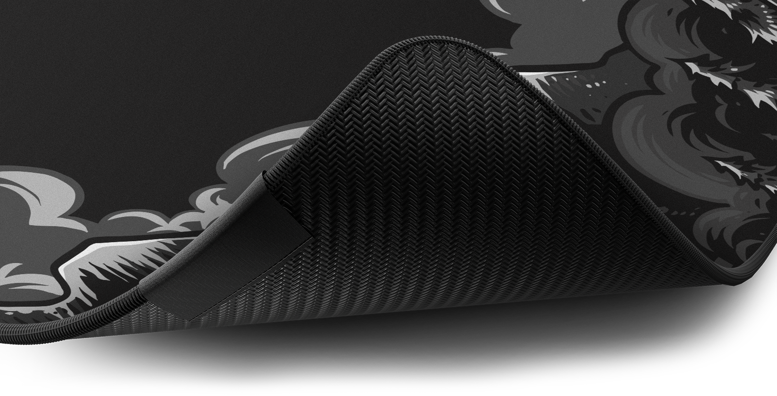 Close-up of the stitched edge and non-slip rubber base of the Hystar Fenrir deskmat