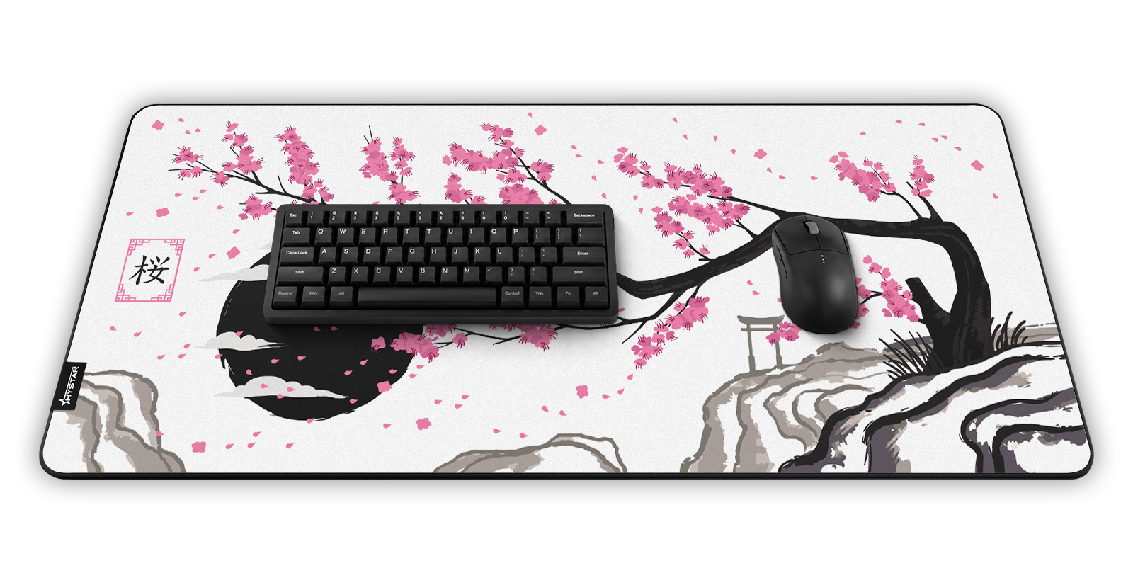 Hystar Sakura deskmat in Light, shown in a desk setup with keyboard and mouse. Light XXL (36" x 16"), Light XXXL (45" x 20")